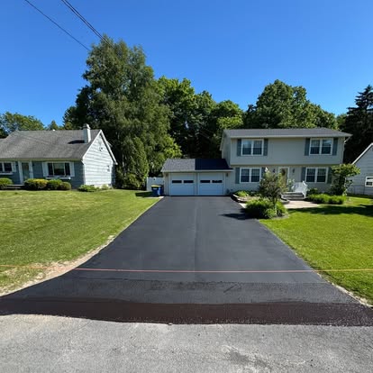 Finished driveway and curb